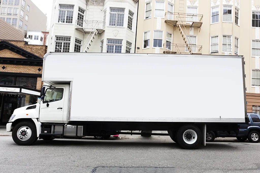 Moving truck on a city street