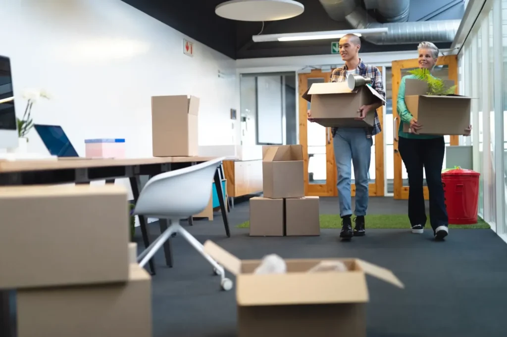 Office movers in Dubai - desks and computers being relocated